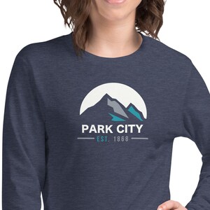 Sleek and Chic Park City Utah Long Sleeve Tee - Show Off Your Love for Skiing and Snowboarding with This Trendy Unisex Shirt!