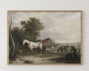 May include: A framed painting of a group of horses in a field. The horses are brown, white, and black. The painting is set against a white wall with a wooden bench and a vase of dried flowers in front of it.