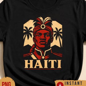 May include: Black t-shirt featuring a red and beige graphic of a person wearing a turban, with the word "HAITI" in beige block letters. The graphic includes palm trees and a star emblem.