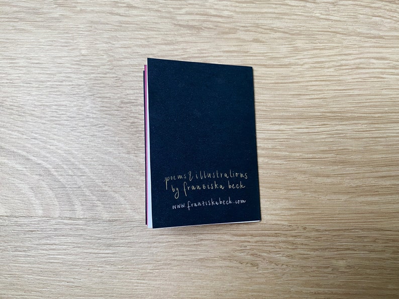 May include: A black book with the text "poems & illustrations by franziska beck www.franziskabeck.com" printed in white on the back cover.