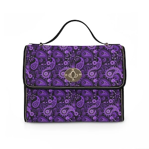 May include: A white ceramic mug with a black handle and the text "But First, Coffee" in a bold, black font. The mug is set against a neutral background, highlighting its simple design.