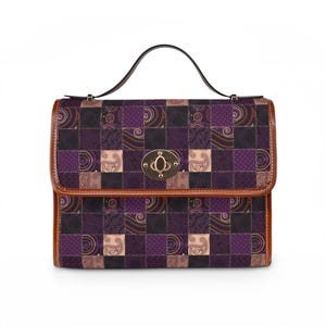 May include: A rectangular handbag with a patchwork design in shades of purple, brown, and black. The bag features a brown leather trim, a top handle, and a metal clasp closure. The patchwork pattern includes paisley and dotted designs.