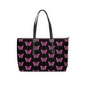 May include: A set of three ceramic mugs with a speckled, matte finish. The mugs are in shades of cream, light gray, and dark gray. Each mug has a simple, minimalist design, perfect for coffee or tea.