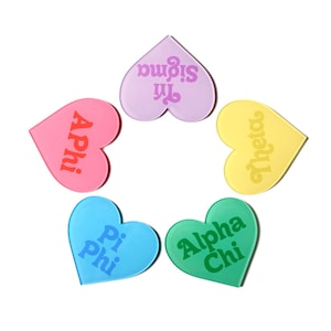 May include: Five heart-shaped items in pink, purple, yellow, blue, and green, each with a different Greek letter combination in a matching color. The hearts are arranged in a circular pattern against a white background.