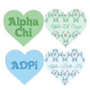 May include: Four heart-shaped stickers with different designs. Two stickers are green with white floral patterns and the text "Alpha Chi Omega" and "Alpha Chi". The other two stickers are blue with white floral patterns and the text "Alpha Delta Pi" and "ADPi".