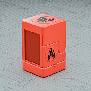 Könnte beinhalten: Eine leuchtend orangefarbene, rechteckige Box mit einem schwarzen Flammendesign auf der Oberseite und der Seite. Die Box hat eine Klapptür und einen dunkelroten Innenraum. Der Hintergrund ist eine hellgraue Oberfläche mit einem Blaupausenmuster.