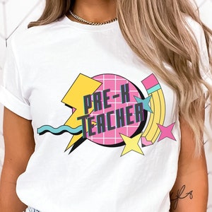 Celebrate the magic of early education and make a statement with this Pre-K Teacher Shirt. A fun retro designed shirt and gift for teachers.