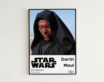 May include: A framed Star Wars poster featuring Darth Maul. The image shows Darth Maul with red and black facial markings and a black hooded cloak. The poster includes the Star Wars logo, Darth Maul's name, and "Portrayed By: Ray Park."