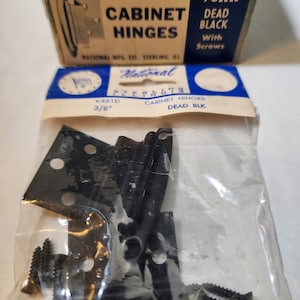 May include: A package of 10 pairs of 3/8 inch black cabinet hinges with screws. The package is labeled "National Sterling" and "V461D".