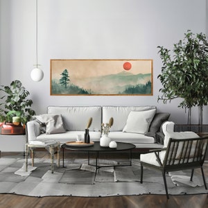 Misty mountain landscape with a red sun, symbolizing Zen tranquility in our Panoramic Wall Art