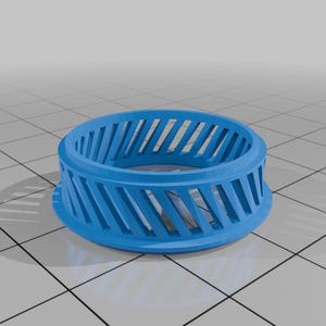 May include: A vibrant blue, ring-shaped object featuring a series of angled slots around its perimeter. The item has a flat base and a curved top, giving it a circular form. The design suggests a decorative or functional item, possibly a component.