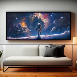 May include: An astronaut stands on a planetary surface, gazing out at a vast, colourful nebula in space. The astronaut is wearing a white spacesuit with a black visor. The nebula is filled with swirling clouds of gas and dust, and there are several stars and planets visible in the background.