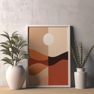 May include: A framed abstract print with a white circle and brown, orange, and beige geometric shapes. The print is hanging on a white wall with two white vases, one with green leaves and the other with dried grass.