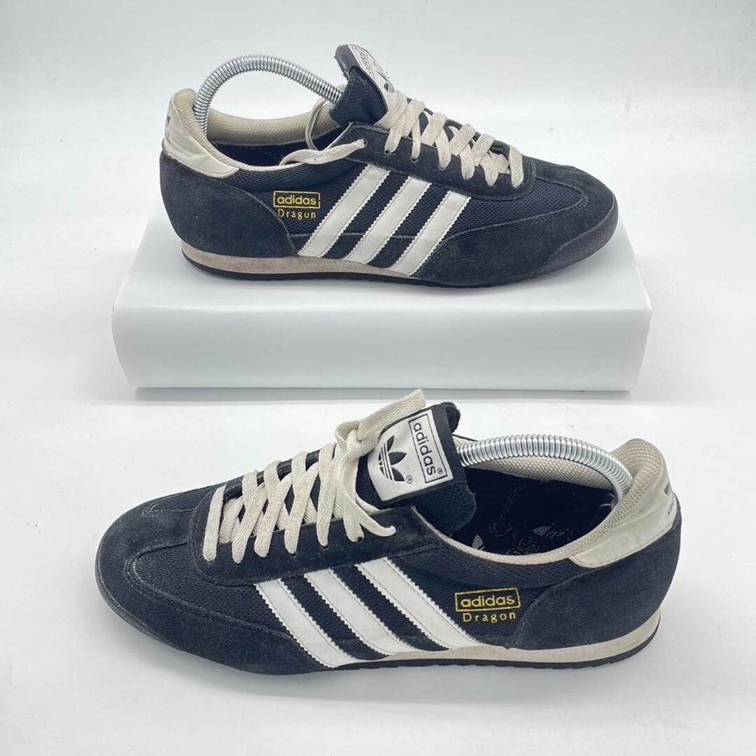 adidas dragon black and gold