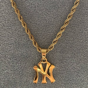 Ny giants deals gold pendant