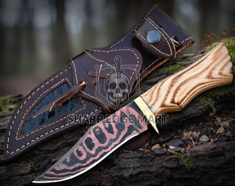 Cuchillo vaquero de caza hecho a mano con acero de Damasco y cobre: mango de madera de fresno y hoja de damasco.