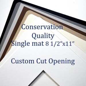 May include: A stack of different colored mat boards with a white mat board on top. The white mat board has a custom cut opening and the text "Conservation Quality Single mat 8 1/2"x11" Custom Cut Opening" printed on it.