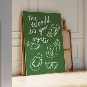 May include: A green poster with white text and illustrations of oysters and lemons. The text reads "The world is your oyster."