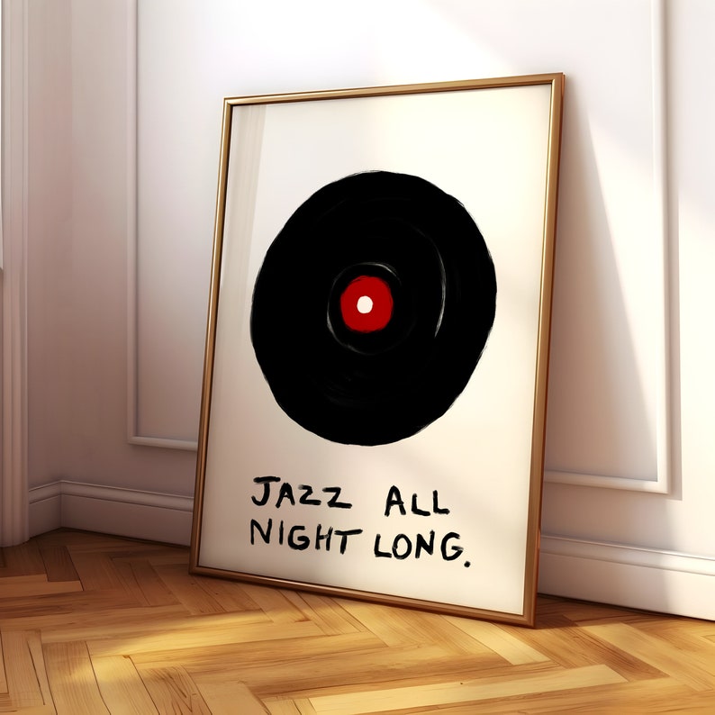 May include: A framed print with a black and white illustration of a vinyl record with a red center. The text "JAZZ ALL NIGHT LONG." is written below the record.