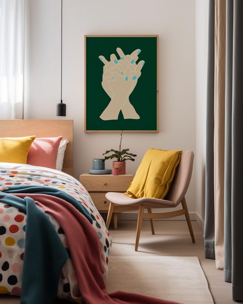 Large dark green poster, there is a picture of hands entwined in the centre of the artwork. It has a modern mid century style. The wall art in hanging ins a colorful bedroom