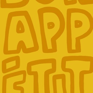 May include: A yellow background with the words "Bon Appetit" written in a brown, outlined font.
