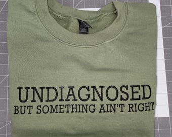 Embroidered "Undiagnosed" Crewneck Sweatshirt: Funny Themed Saying