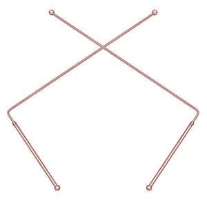 May include: A rose gold metal decorative object with a geometric design. Two straight bars intersect in an X shape, with two additional bars extending downwards. Each end has a small, round ball.