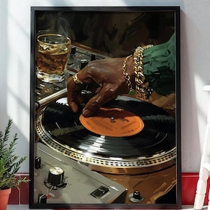 May include: Framed art print showing a DJ's hand with gold jewellery on a turntable, with a glass of amber liquid. The vinyl record has an orange label. The artwork has a dark, moody aesthetic, with a focus on music and nightlife.