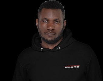 May include: Black hoodie with the word "NASBS" in white and red lettering. The hoodie has a drawstring hood and long sleeves. The person in the image is wearing blue jeans.