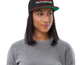 May include: A black and green baseball cap with a red brim and white embroidered text that reads "NASCAR".