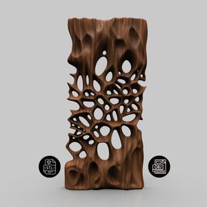 May include: A tall, brown, wooden sculpture with a unique, organic design. The sculpture features numerous irregular holes and a textured surface, creating a visually striking piece. The artwork is likely a decorative item or a piece of modern art.
