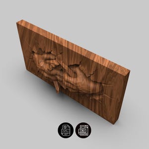 May include: A rectangular wooden relief sculpture showing two hands reaching out. The wood grain is visible, and the hands appear to be emerging from a cracked surface. The sculpture is a warm brown colour.