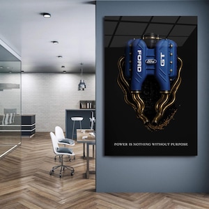 May include: Blue Ford GT engine illustration with gold exhaust pipes against a black background. The image includes the Ford logo and the text "POWER IS NOTHING WITHOUT PURPOSE."