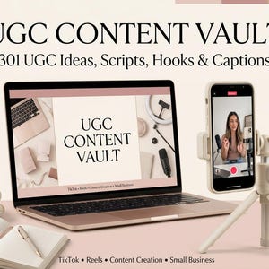 May include: A laptop displaying the text UGC CONTENT VAULT 301 UGC Ideas, Scripts, Hooks & Captions, alongside a smartphone on a tripod stand. The screen shows a person recording video content. A notebook, pen, and coffee cup are also visible.