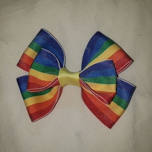 Hair bow. Rainbow grosgrain ribbon 3 1/2 inch hair bow on alligator clip