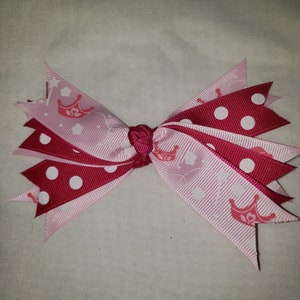 Hair bow. Pink and white polka-dots and crowns grosgrain ribbon 5 inch hair bow on alligator clip