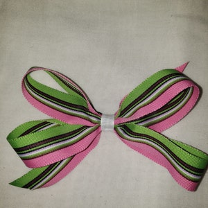 Hair bow. Pink, green, white, purple and brown stripe grosgrain ribbon 5 inch hair bow on alligator clip
