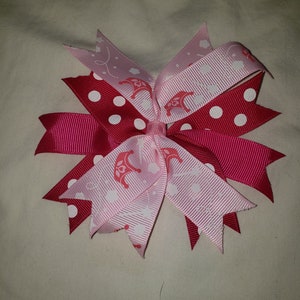 Hair bow. Pink with crowns grosgrain ribbon 4 1/2  inch on alligator clip
