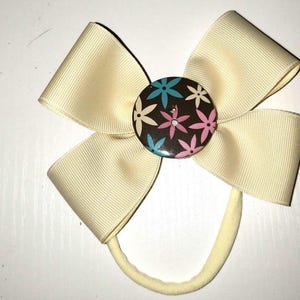 Hair bow off white grosgrain ribbon on nylon  headband