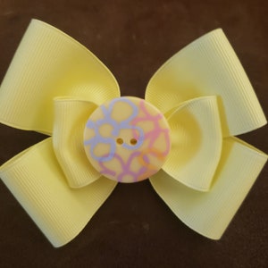 Hair bow. Yellow grosgrain ribbon 5 inch on french barrette