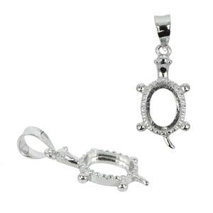 May include: Two silver turtle pendant settings with oval shaped bezels. The settings are designed to hold a gemstone or cabochon.