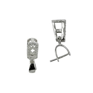 May include: Two silver-colored pendant bails. One bail is upright, the other is angled. Both have a rectangular top with a cross-shaped design and small, clear stones. The bail has a loop for attaching to a chain.