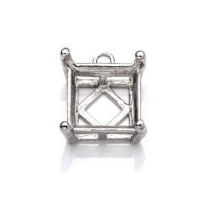 May include: A silver-colored square jewelry setting with four rounded prongs at the corners. The setting has a diamond-shaped design in the center and a small loop at the top for attaching to a chain or other jewelry component.