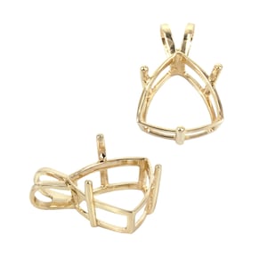 May include: Two gold-colored pendant settings, designed to hold a triangular gemstone. The settings have a delicate, open framework with prongs to secure the stone. The bail is a loop for a chain. The pendants are shown against a white background.