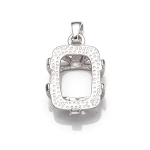 May include: Silver pendant setting with a rectangular bezel, designed to hold a gemstone or other embellishment. The setting has a textured surface and a delicate design.