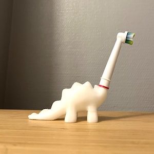 Dino Oral-B Zahnbürstenhalter, Bad-Organizer, niedliches Tier-Dekor, kinderfreundliches Accessoire, Zahnpflege-Aufbewahrungsregal