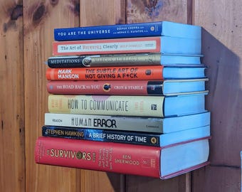 Libreria galleggiante nascosta, espositore per libri invisibile a parete, ripiano segreto, arredamento moderno per la casa.