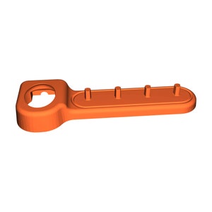 an orange plastic object with a hole in the middle