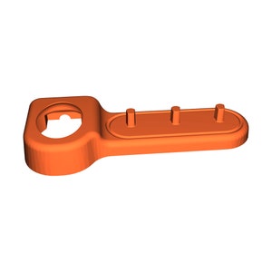 an orange plastic object with a hole in the middle