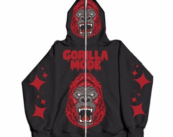 May include: Black zip-up hoodie with a red gorilla face on the hood and chest. The text "GORILLA MODE" is printed in red dripping letters on the chest. The sleeves have red star-shaped designs.